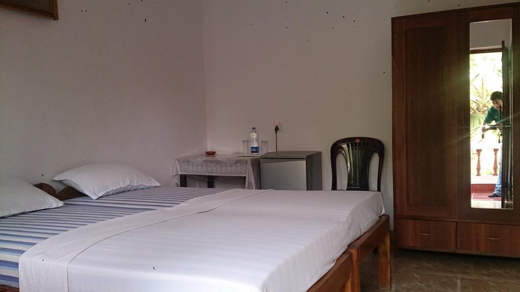 Domingos Guest House Baga Bilik gambar